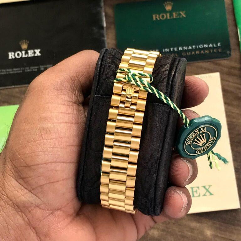 Role_x Day Date Gold Watch